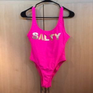 Hot pink and gold women’s one piece swim suit.